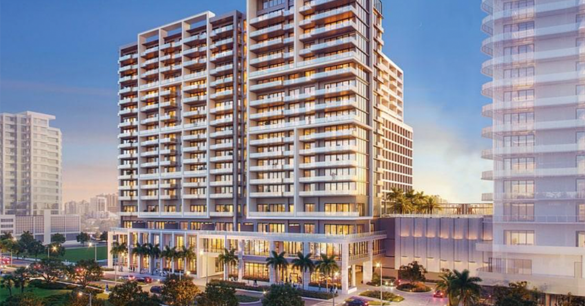 Rendering of a modern luxury condominium tower along a landscaped city boulevard