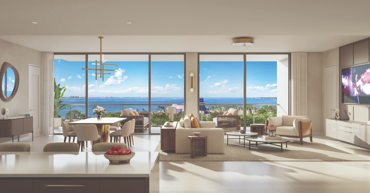 Open living room and dining area with water views in Sarasota