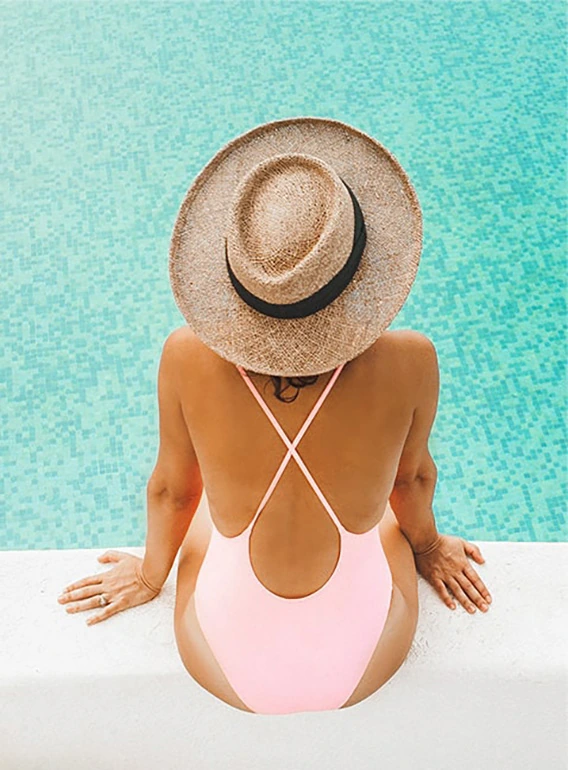 Residents enjoying poolside atmosphere at 1000 Boulevard of the Arts resort-style amenities in Sarasota